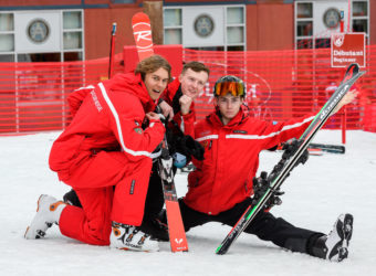 Dressed in typical ski school uniform